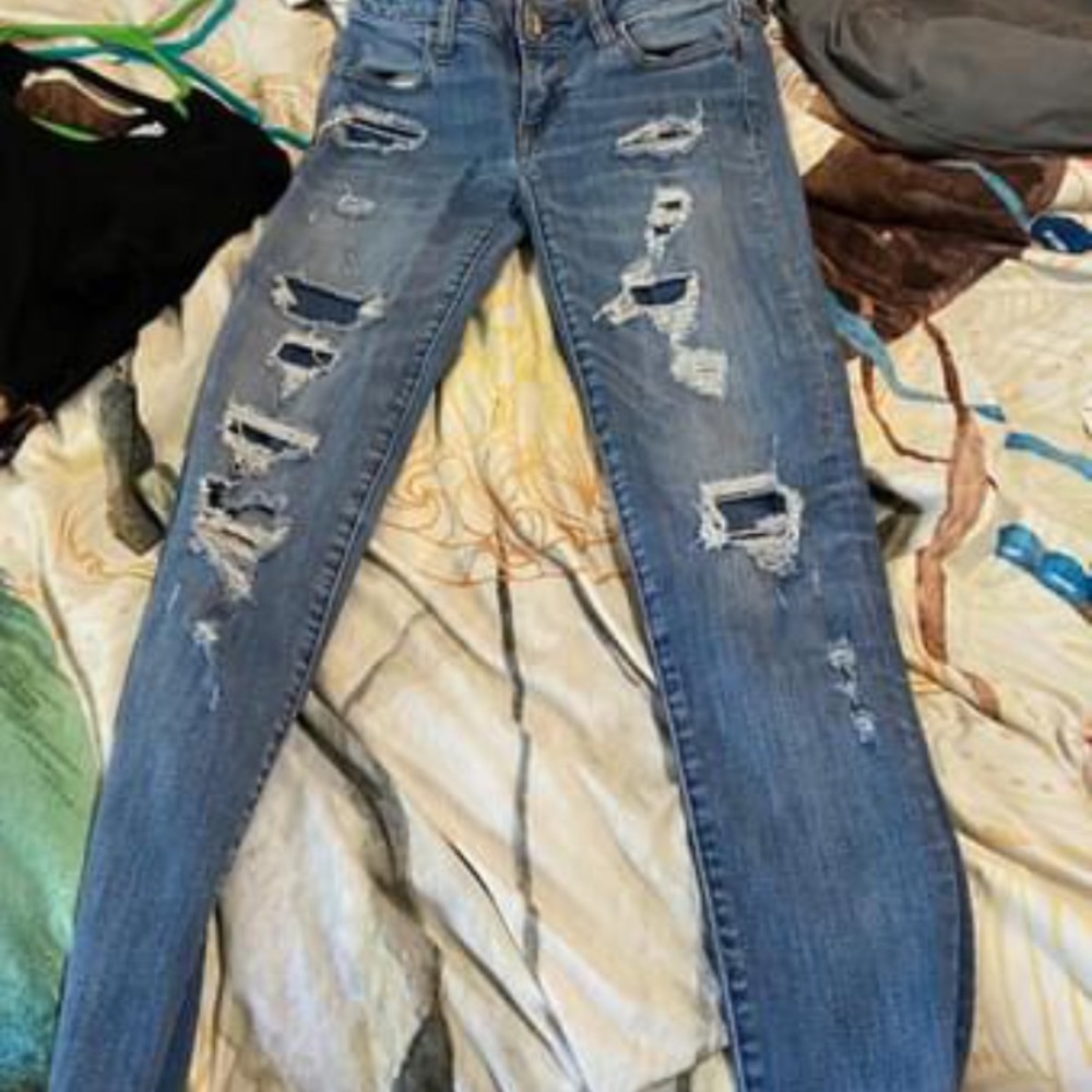American eagle skinny jeans, factory holes, size 0